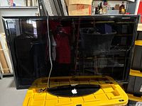 Front view of Samsung 40 inch LED TV showing screen and stand, no remote in sight.