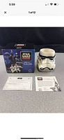 Star Wars Classic Collection box next to the Stormtrooper shaped coffee mug with two paper inserts displayed in front