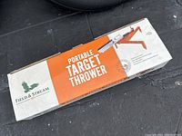 Boxed Field & Stream Portable Target Thrower showing packaging with brand and product name