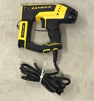 Full view of Stanley Fatmax Multi Tacker pneumatic stapler with power cord and trigger, showing overall condition.