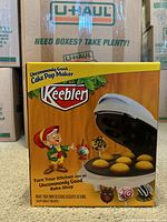 Front and partial side view of the Keebler cake pop maker box showing product image and branding.