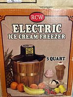 View of original box showing RCW Electric Ice Cream Freezer 5 Quart with retro wooden bucket design and ice cream illustrations.