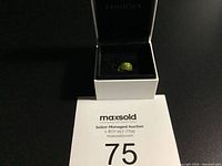 Pandora charm presented in its original branded box with black velvet interior and white exterior.