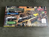 Box top with full view of the train set including Canadian National locomotive and branded freight cars.