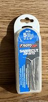 Photo shows a blue plastic case with 5 SabreCut zip bits inside, labeled with RotoZip brand and size details.
