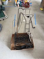 Photo showing all items laid out including shepherds hooks, border fencing panels, garden stakes and solar lights
