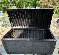 Open lid showing interior volume and struts