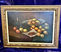 Frontal view of the framed still life painting showing full composition