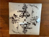 Square white glass ceiling light cover with black printed Davy Crockett motif and central attachment hole.
