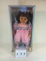 Full front view of the Lissi Lacey collectible doll in original packaging