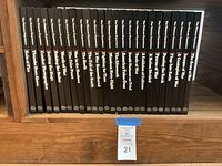 Photo showing full set of 25 black hardcover books with white titles and series name 'The Vietnam Experience' on the spine.