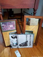 Three items shown: One canvas print of two horses; two wood framed mirrors, one with vintage horse photo attached.