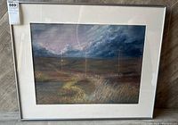 Front view of the framed pastel artwork showing the landscape scene with a cloudy sky and a winding path.