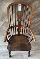 Angled front view showing overall shape, seat, back and arms