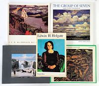 Five Canadian art books displayed together showing covers of various artists including Edwin H. Holgate portrait, landscape paintings, and other art.
