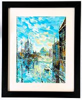 Framed acrylic impressionist cityscape painting with bright blue and warm colors, signed and dated lower right