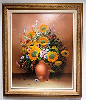 Frontal view of the oil painting showing full floral composition and wood frame.