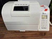 Front view of white Baker's Choice Automatic Bread & Dough Maker with control panel and display showing 3:30 timer.