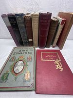 View of ten vintage hardcover books focused on British royalty, showing a range of spine colors and titles predominantly about Kings Edward VII, Edward VIII, Queen Elizabeth, and related historical topics.