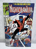 Front cover of Nightcrawler #1 comic book showing Nightcrawler in action pose with swords and background characters. Marvel logo, pricing, and issue notes visible.