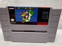 Front view of the gray SNES cartridge with colorful Super Mario World label showing Mario riding Yoshi.