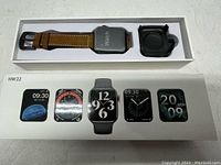 Image showing Smart Watch6 packaged with brown leather strap, extra black strap, and original box with watch face images.