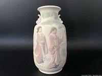 Front and side views of the Lladro Mini Tibor Japanese porcelain vase showing two female figures and tree details in matte pastel colors.