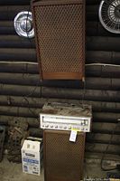 Receiver placed on one speaker cabinet with second speaker mounted behind; overview of all components and cabling