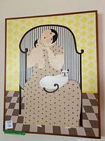 Full view of framed acrylic painting showing seated woman holding baby with cat at lap, floral wallpaper background and checkered floor
