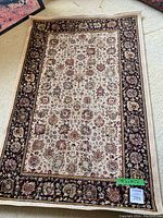 Full view of handwoven rug showing overall pattern and color scheme.