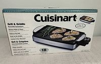 Front of original box showing product image of grill and griddle with food on it, highlighting reversible function and 18-inch cooking surface.