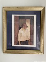 Front view of the framed print showing the artwork and gold ribbed frame.