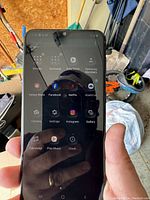 Samsung smartphone screen showing apps, powered on and functioning