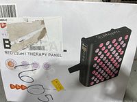 Box showing Lifepro Bioheal red light therapy panel image and brand information.