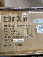 Closeup of the box labeling showing model LP-PCRMP-BLK, weights, and dimensions.