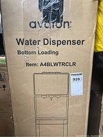 Front view of original packaging box for Avalon water dispenser bottom loading model A4BLWTRCLR, showing brand, item number, and basic line drawing.