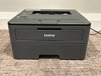 Front view of Brother HL-L2370DW laser printer showing front panel and branding