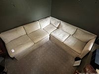 Overhead shot of L-shaped sectional sofa in corner position