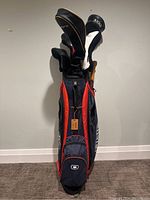 Front view of OGIO cart bag loaded with golf clubs
