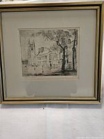 Full view of the framed etching depicting Hart House, University of Toronto by Owen B. Staples.