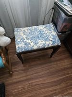 Perspective view of bench from above highlighting cushion and frame proportions.