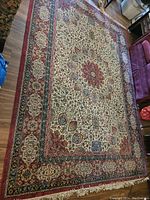 Top-down view of entire rug showing central medallion and border