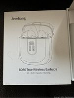 Box front showing Jesebang BD86 True Wireless Earbuds branding and illustration of the earbuds in the charging case.
