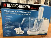 Box of Black & Decker Quick 'N Easy Plus Food Processor showing product information and features on the packaging.