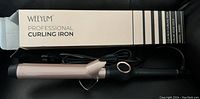 Photo of Weyum Professional Curling Iron in rose gold color, showing the curling iron and its box with branding and product details.