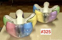 Two five-lobed Italian art pottery bowls displayed together