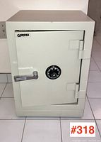 Front view of Gardex safe showing door, combination dial, and handle