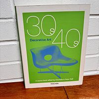 Front cover of the book 'Decorative Art of the 30s & 40s' with green and white graphic design and chair illustration.