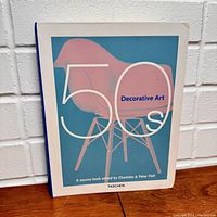Front cover of the book showing a stylized image of two mid-century modern chairs with '50s Decorative Art' text.