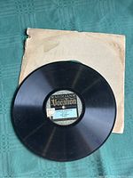 Top view of Aeolian Vocalion vinyl record with visible label and original paper sleeve underneath.